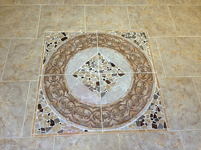 Ceramic medallion laid into foyer floor