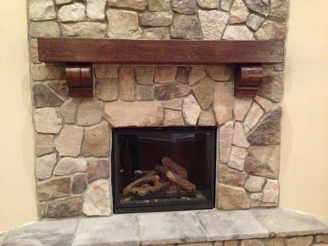 Fireplace with custom timber mantel
