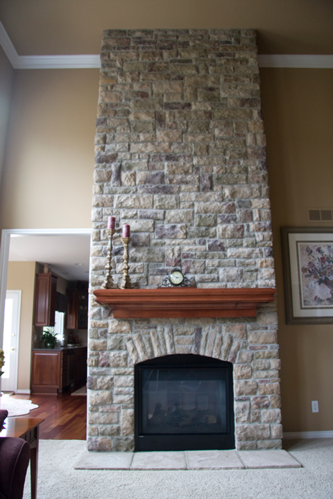 Fireplace with external brick from ceiling to floor