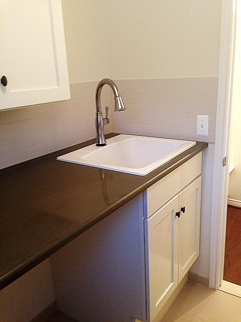 Laundry room with quartz counter top