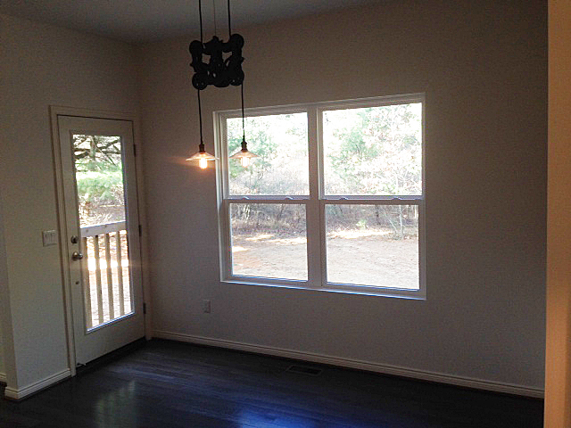 Nook off the side of the kitchen with access to backyard