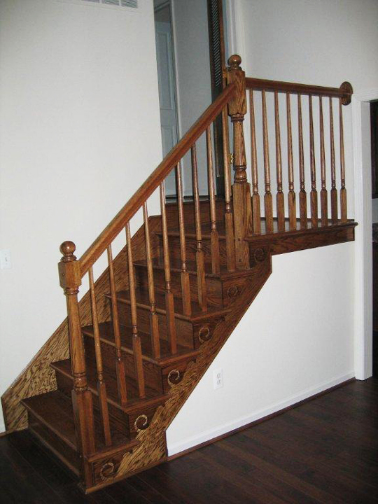 Stairway with maple railing