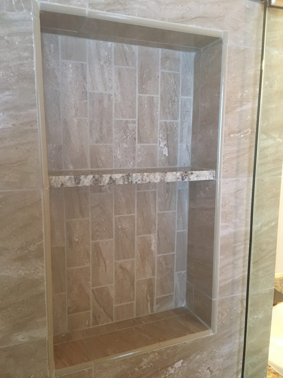 Custom shower nich inside master bath shower