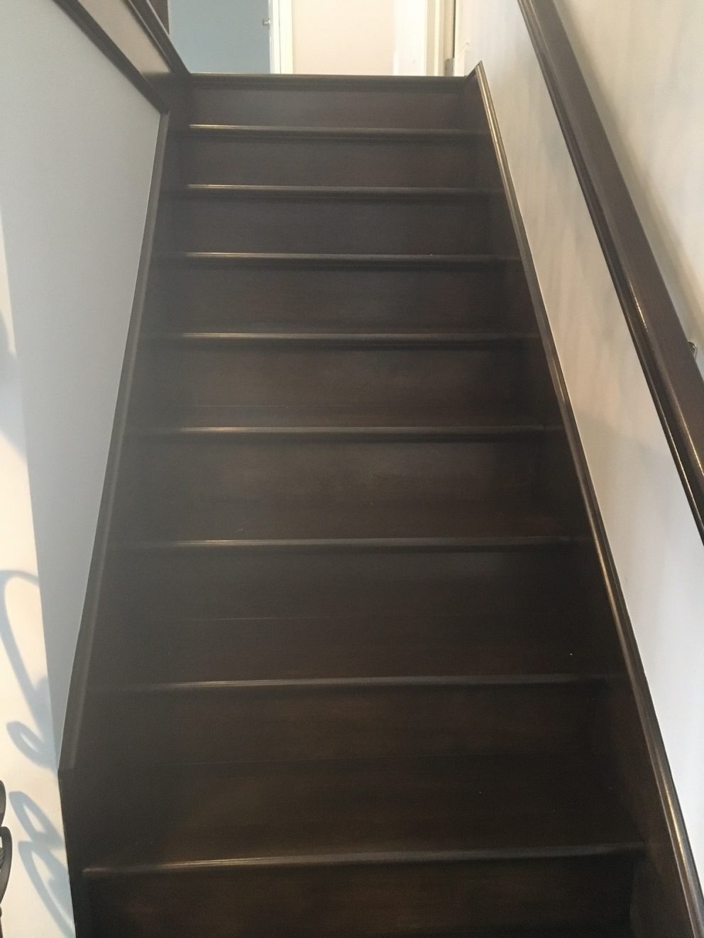Full wood staircase with dark mocha finish